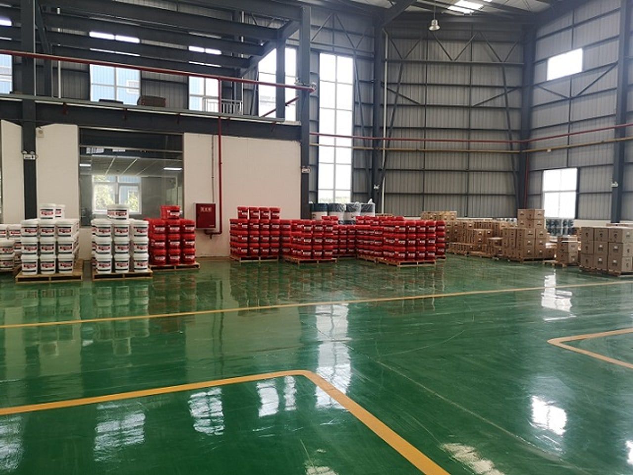 Finished lubricant goods stored on pallets in the warehouse